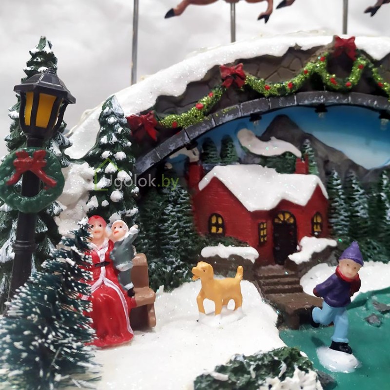 Сувенир новогодний светодиодный Санта на санях 33х27 см в ассортименте