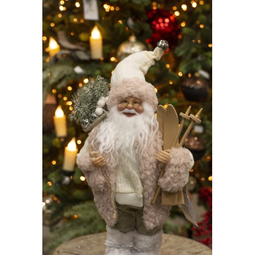 Дед Мороз в розовой шубке с лыжами и подарками, 30 см (21835-30) Дед Мороз в розовой шубке с лыжами и подарками, 30 см (21835-30)