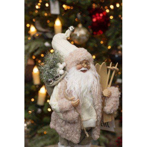 Дед Мороз в розовой шубке с лыжами и подарками, 30 см (21835-30) Дед Мороз в розовой шубке с лыжами и подарками, 30 см (21835-30)