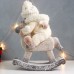 Сувенир из керамики "Малышка в комбинезоне с мехом, на лошадке-качалке" 7567961